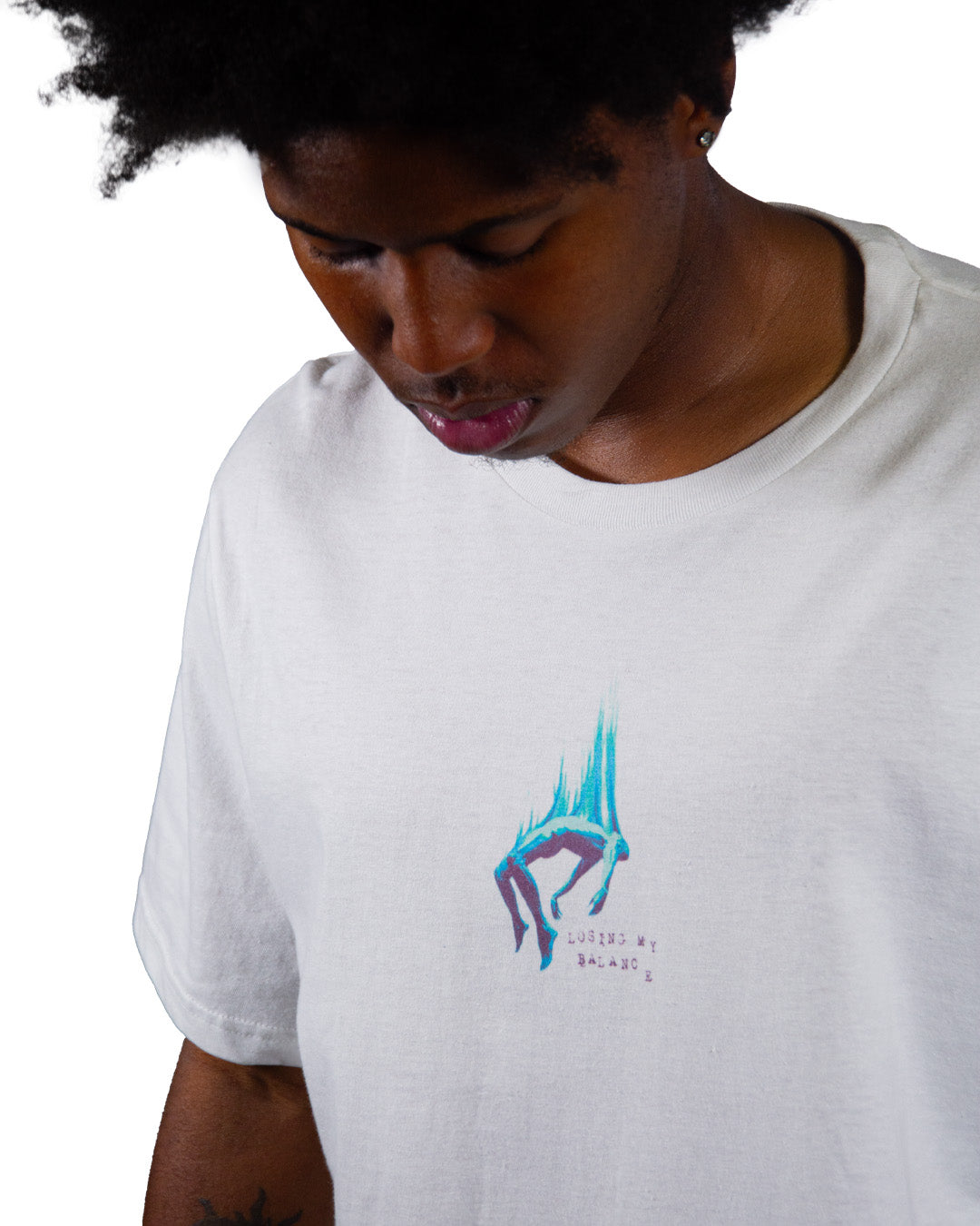 White streetwear t-shirt with abstract turquoise chest print by Glim Clothing.